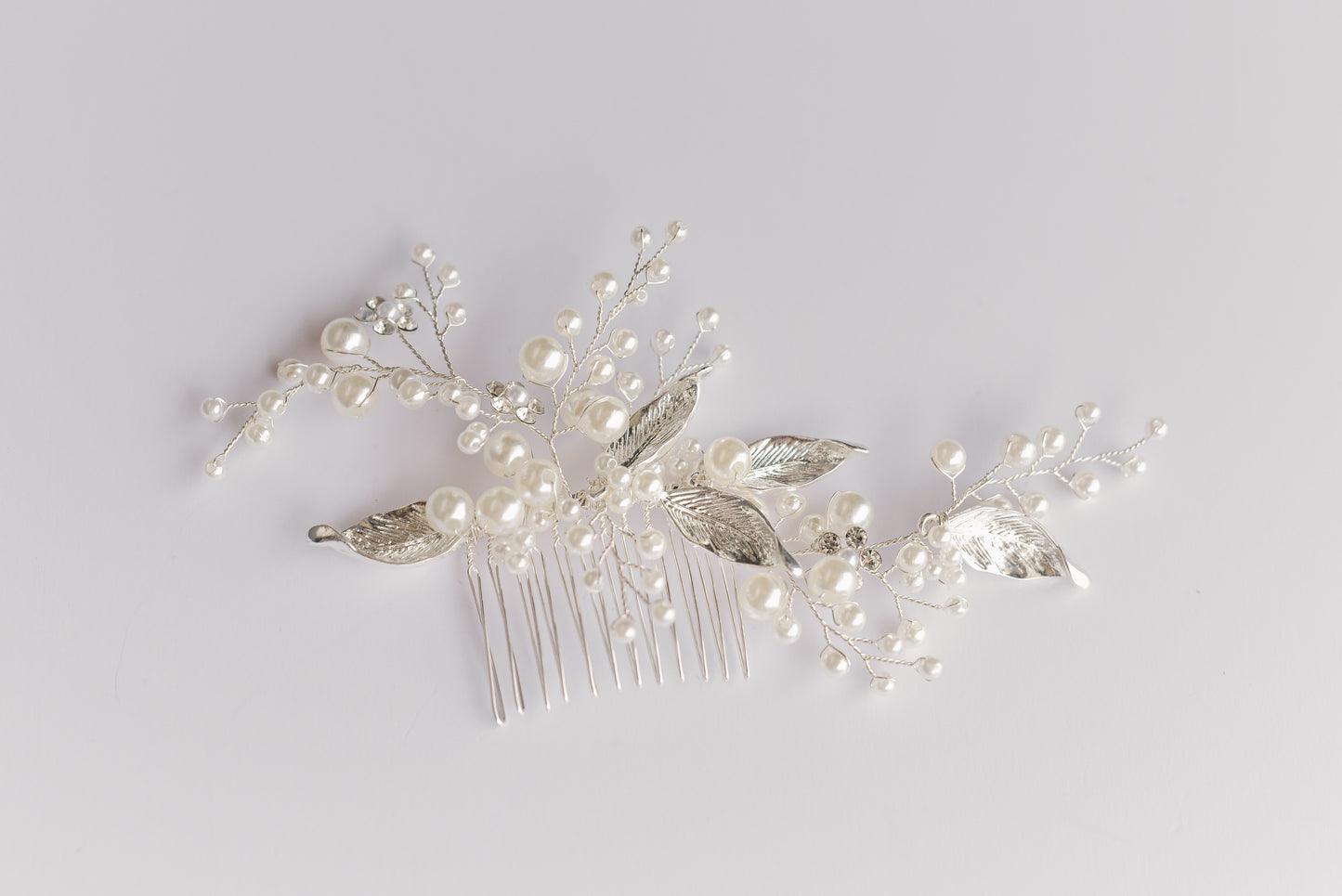 Silver bridal hair comb with pearls and leaves 