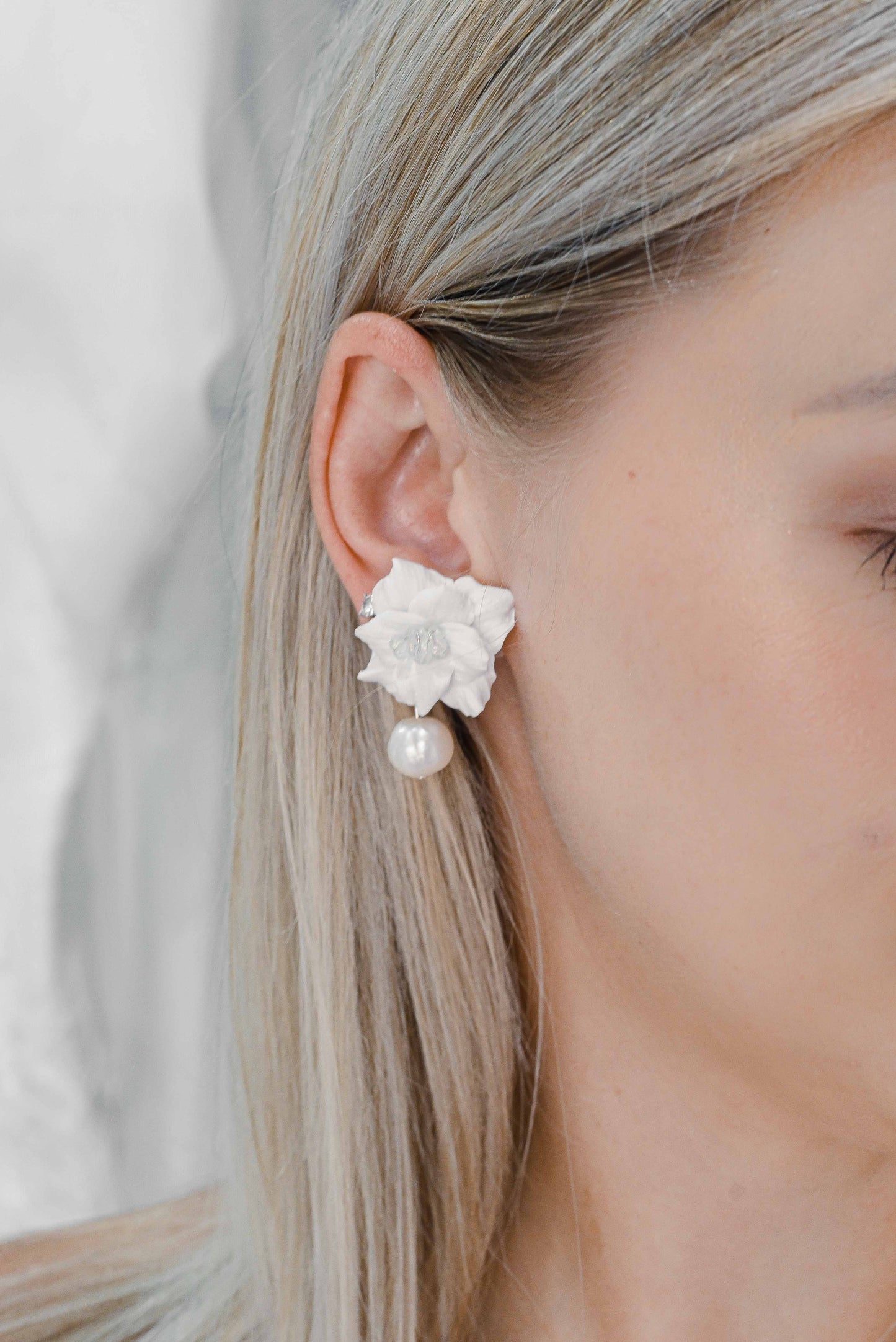 Clay flower bridal earring with a freshwater pearl