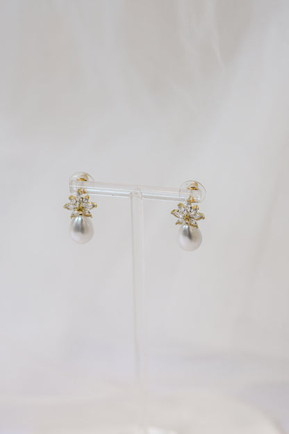 Gold cubic zirconia earrings with a teardrop pearl