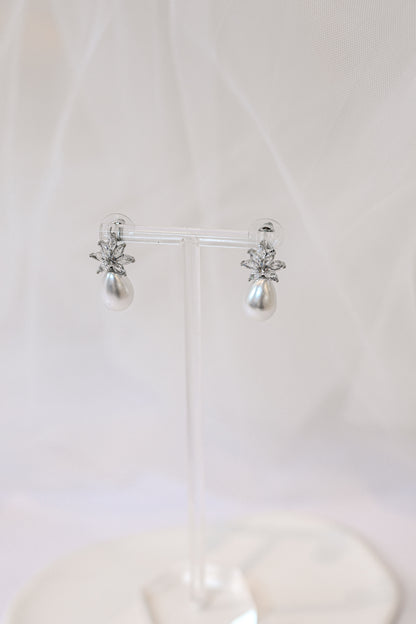 Silver cubic zirconia earrings with a teardrop pearl
