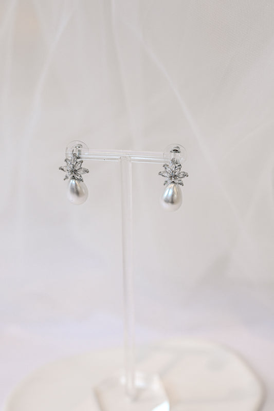 Silver cubic zirconia earrings with a teardrop pearl