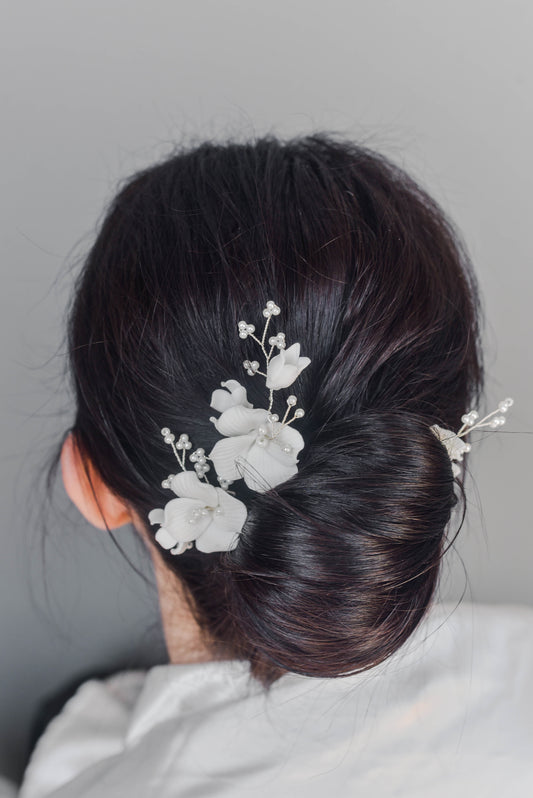 Bride wearing floral hair pins